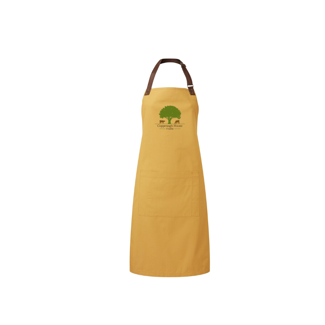 Mustard apron against a white background