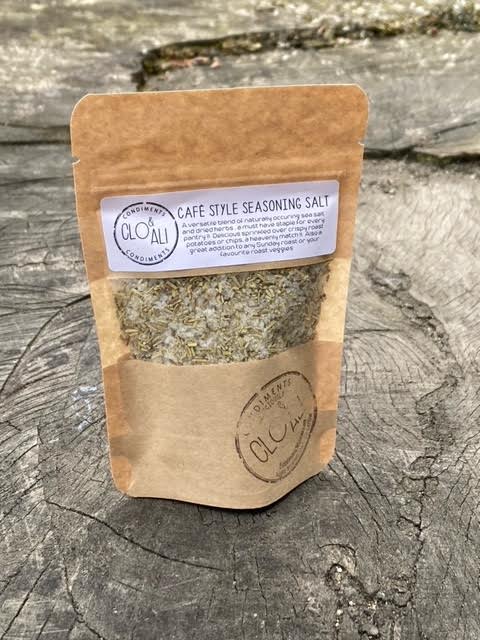 Bag of seasoning salt against a wooden background