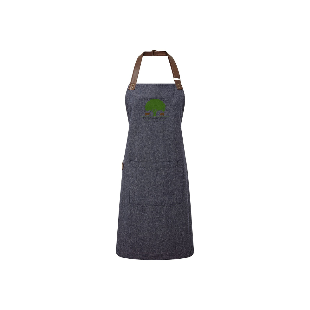 Denim apron against a white background