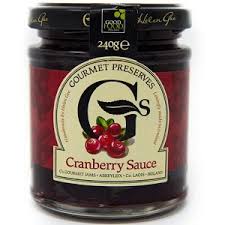Jar of Gourmet Preserves cranberry sauce with a visible brand logo.