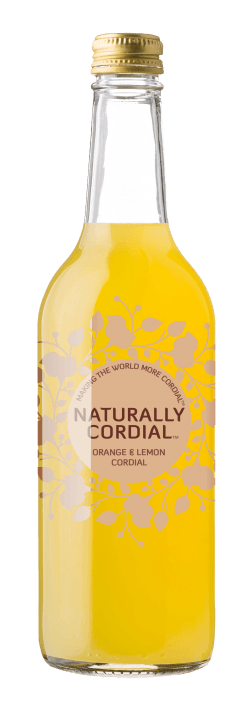 Bottle of cordial against a black and grey checkered backround