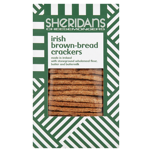 Packaging for Sheridans Brown Bread Crackers showing the crackers visible through the clear window, with green and white geometric patterns and product details.