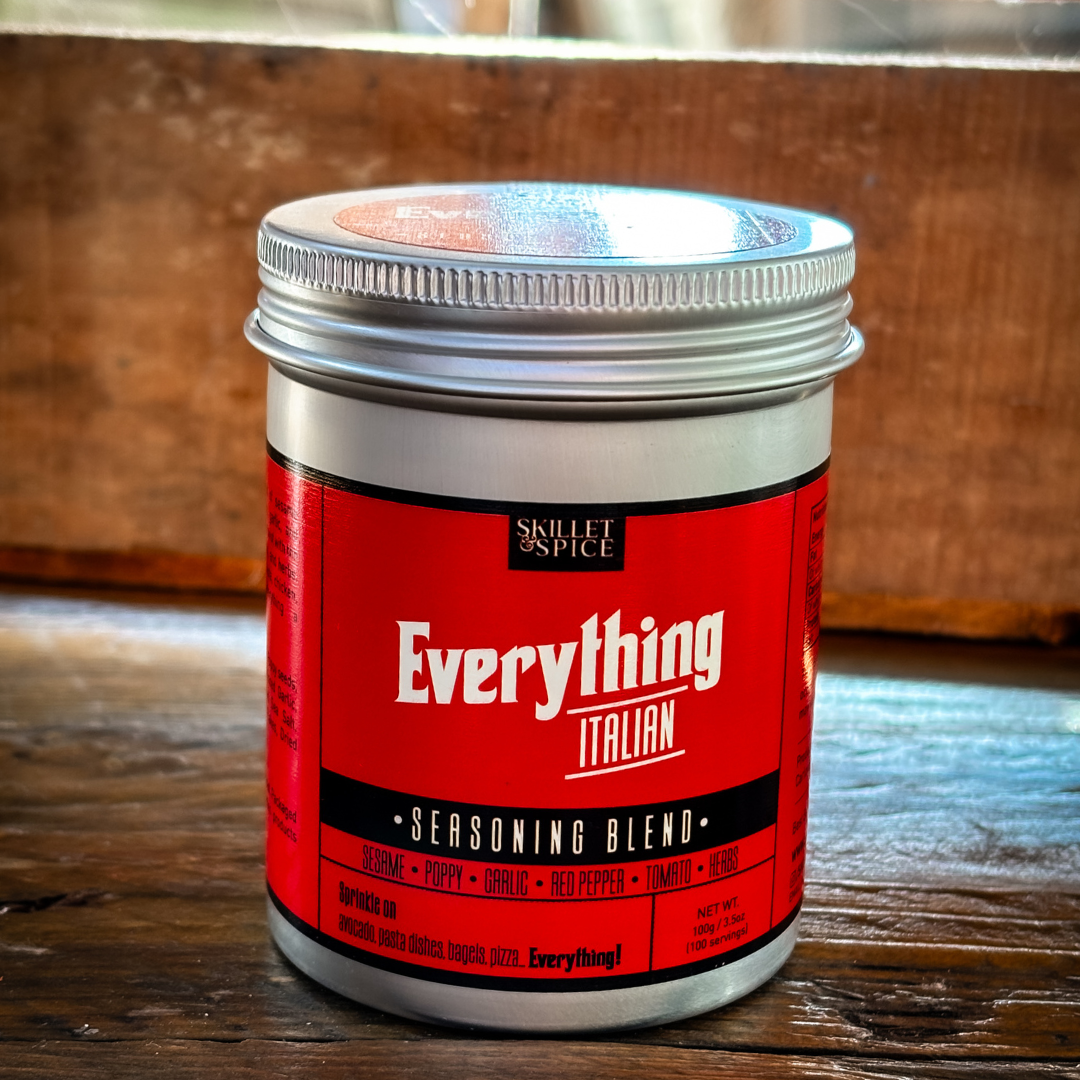 Tub of seasoning against a wooden background