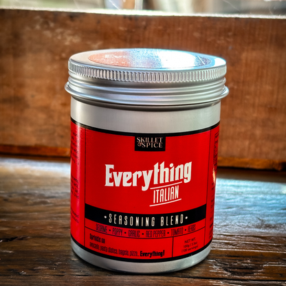 Tub of seasoning against a wooden background