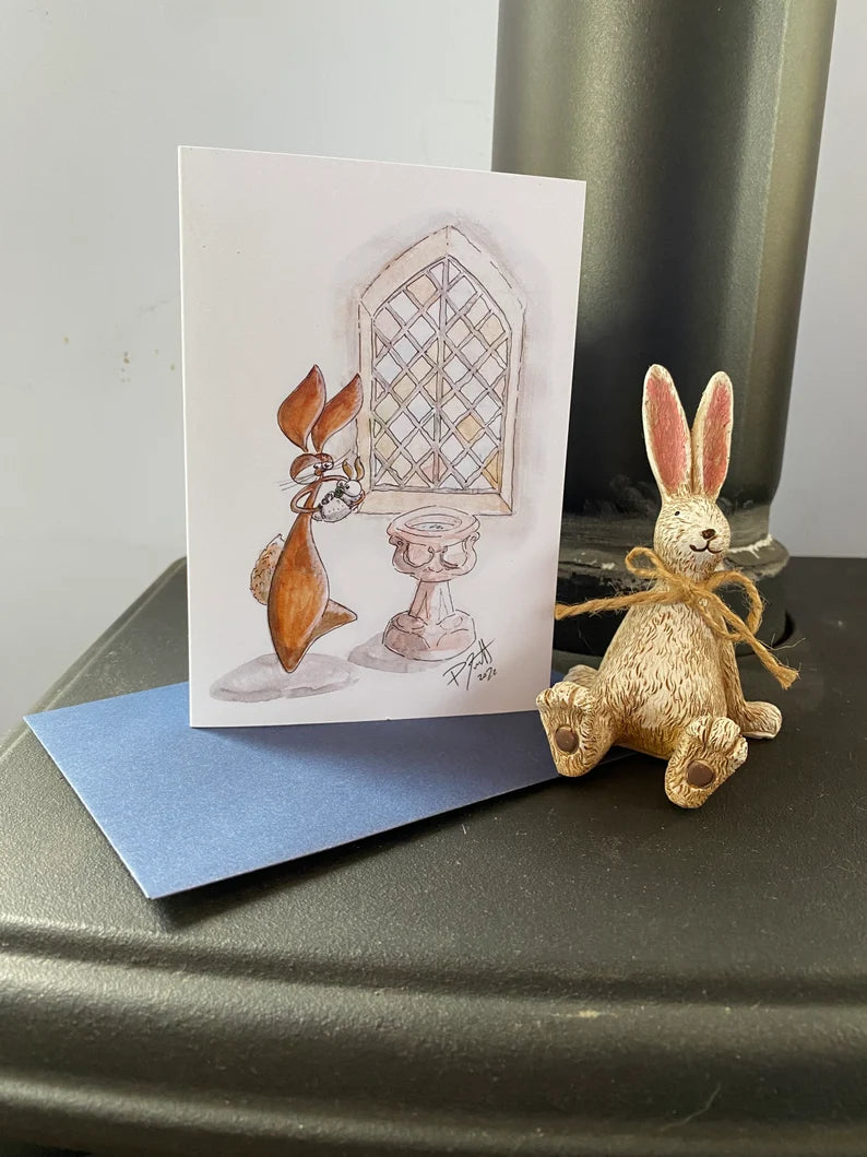 Christening card with a pole in the background