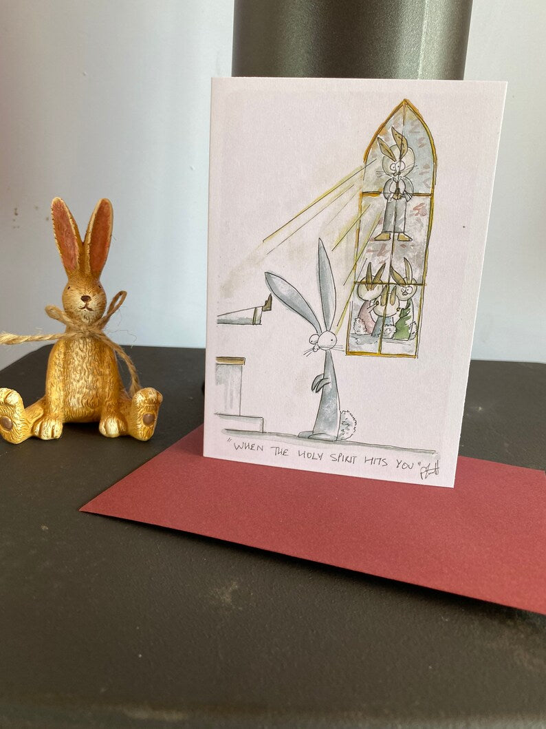 Card with a rabbit in church