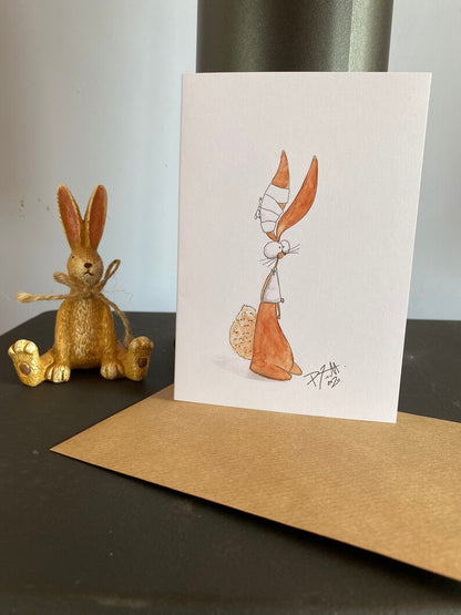 Card with a rabbit that is injured