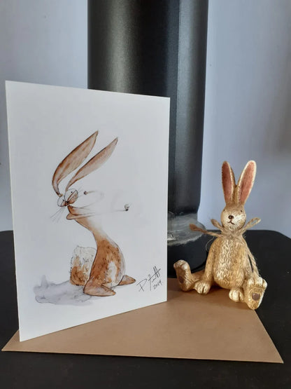 Card with a rabbit holding a ring